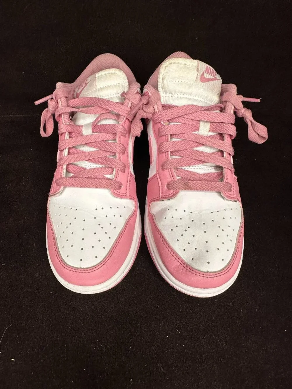 These sneakers are the Nike Dunk Low Next Nature 